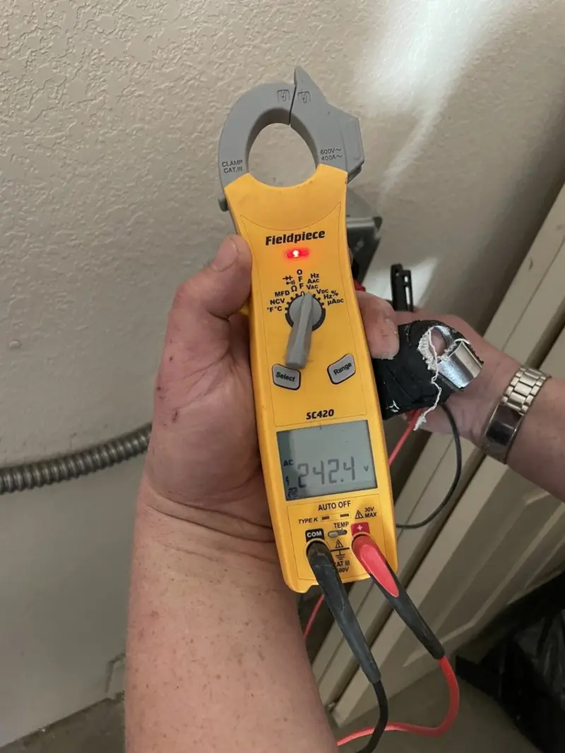 Voltage testing with clamp meter during Recessed Lighting Installation in Pontiac